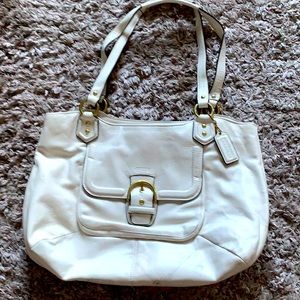 Coach leather purse/handbag beautiful and classy Liz can fit A-4 size papers.